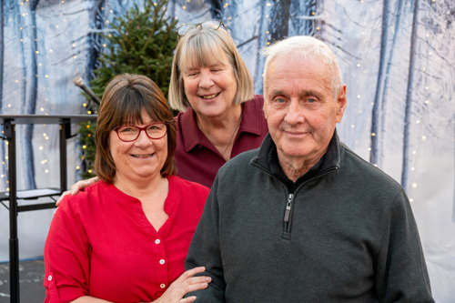 A picture of Michael Ryan being presented with his Best Floral Display award